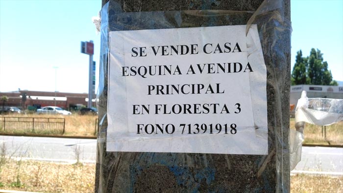 Aviso en poste alumbrado público